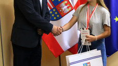 Tomasz Jamka gratuluje sukcesu uśmiechniętej wicemistrzyni Europy w Sumo