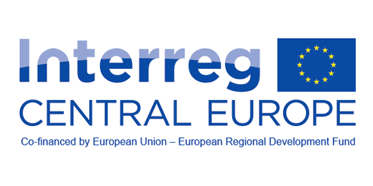 Logo Interreg Europa Środkowa. Obok flaga Unii Europejskiej, na niebieskim tle okrąg z gwiazdek w kolorze żółtym