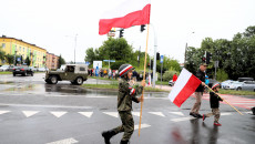 Małychłopiec W Stroju Powtańca Z Flagą Narodową