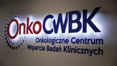 Logo Onkologicznego Centrum Wsparcia Badań Klinicznych